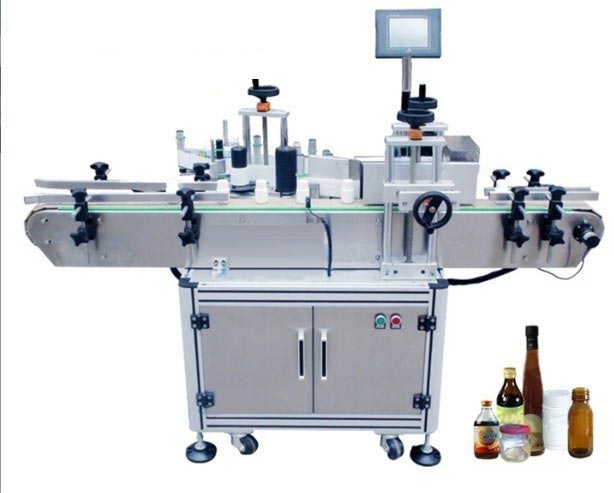 Etiqueteuse automatique de bouteilles rondes